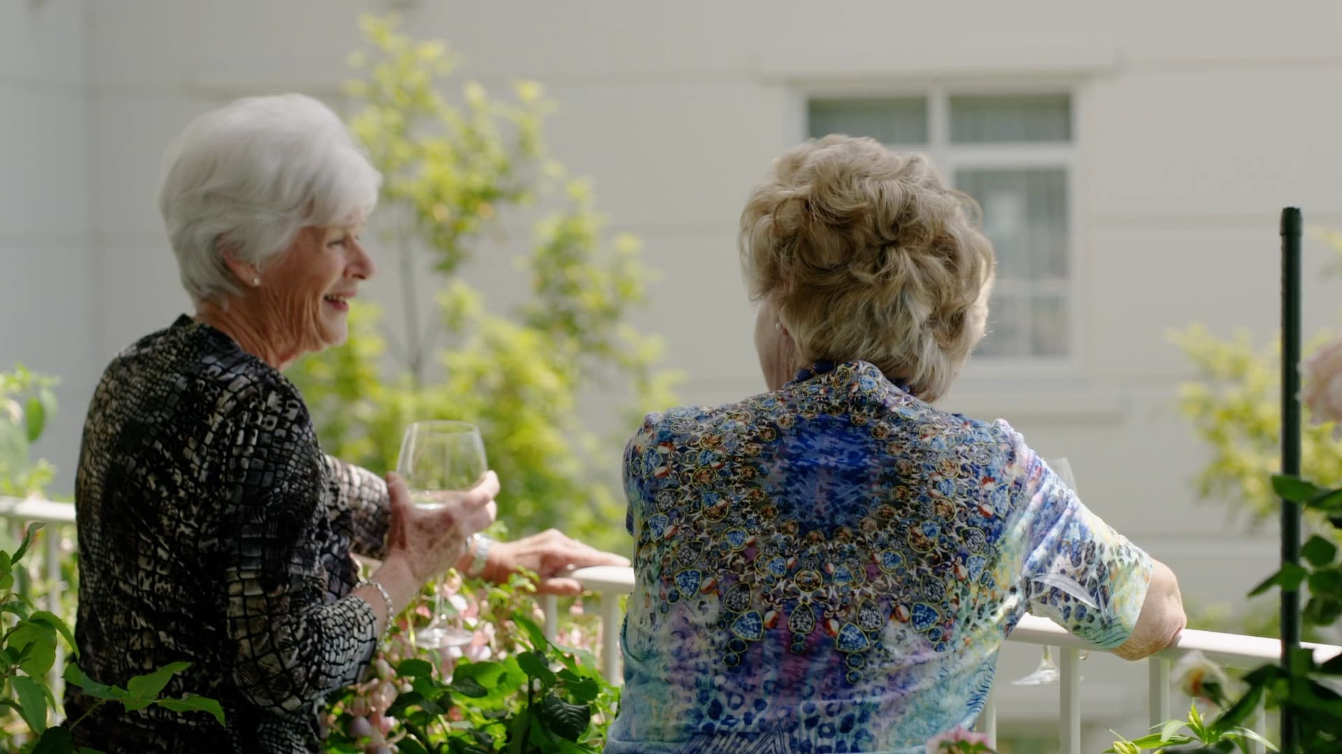 Settlers still Ladies on veranda